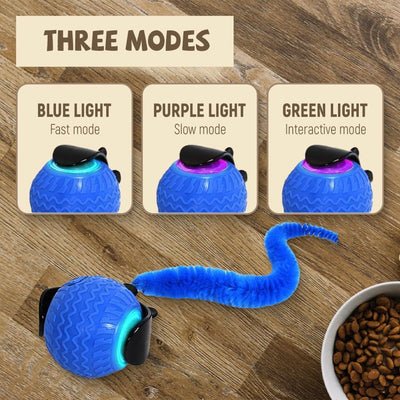 Pet toy with blue light mode on a wooden surface, showing three modes: Blue Light, Purple Light, and Green Light.